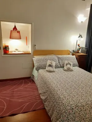Letto o letti in una camera di Napoli centro storico Un Passo da San Gennaro