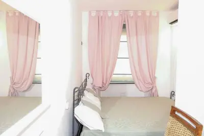 Letto o letti in una camera di Napoli centro storico Un Passo da San Gennaro