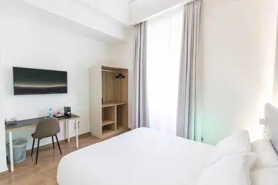 Letto o letti in una camera di Sanfelice 33 Luxury Suites