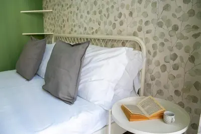Letto o letti in una camera di Appartamento all'Archivio di Stato by Wonderful Italy