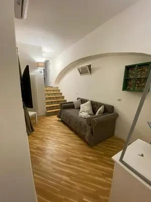 Area soggiorno di Alcaprì Suite Napoli Centro