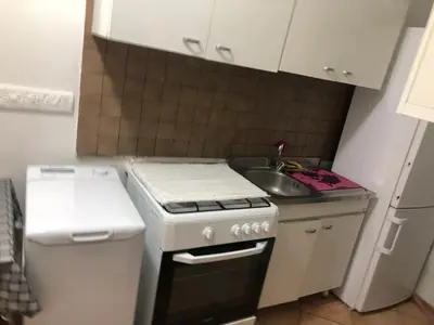 Cucina o angolo cottura di Quartieri Spagnoli Home AFFITTI BREVI