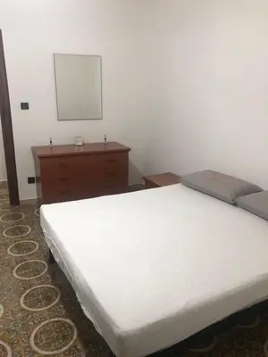 Letto o letti in una camera di Quartieri Spagnoli Home AFFITTI BREVI