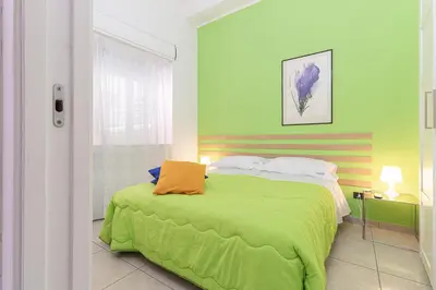 Letto o letti in una camera di da ARMIDA VIP Flat