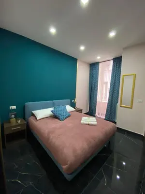 Letto o letti in una camera di Katarios Suite