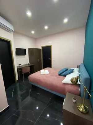 Letto o letti in una camera di Katarios Suite