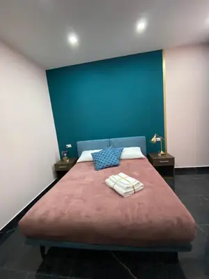 Letto o letti in una camera di Katarios Suite