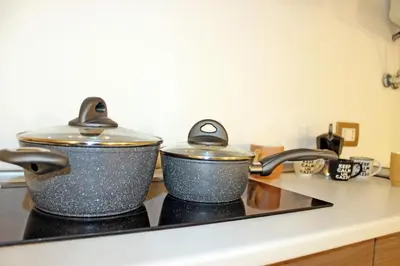 Cucina o angolo cottura di Appartamento In Piazza