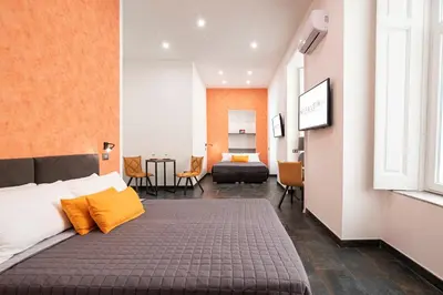 Letto o letti in una camera di Napul'è 19