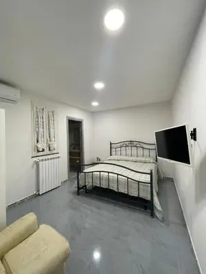 Letto o letti in una camera di La casa di Adele