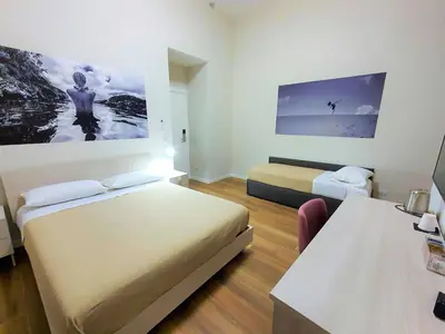 Letto o letti in una camera di Toledo Place