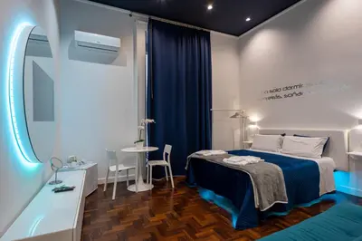 Letto o letti in una camera di Skyhouse Duomo