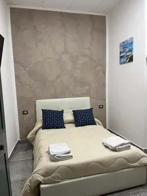 Letto o letti in una camera di riccia, frolla e babbà