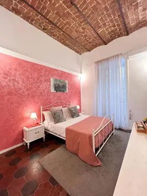 Letto o letti in una camera di Suite Scarlatti
