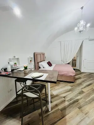 Letto o letti in una camera di Donn'Anna Naples City Center