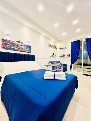Letto o letti in una camera di Donn'Anna Naples City Center