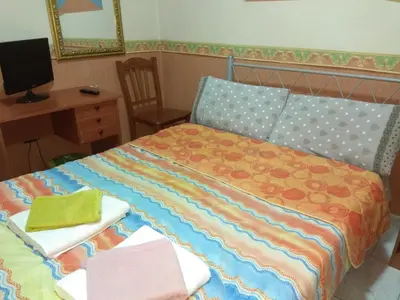 Letto o letti in una camera di Astra