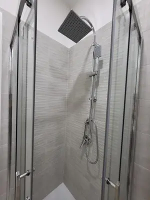 Bagno di New Era Rooms