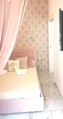 Letto o letti in una camera di Domus Leone Tre