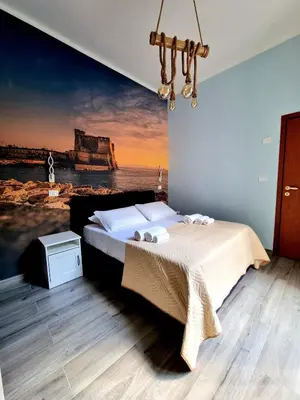 Letto o letti in una camera di DUOMO 152 NAPOLI