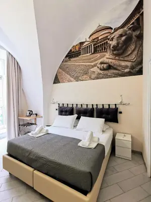 Letto o letti in una camera di DUOMO 152 NAPOLI