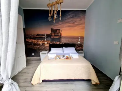 Letto o letti in una camera di DUOMO 152 NAPOLI