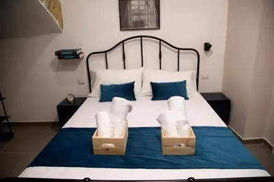 Letto o letti in una camera di Bottega Orafa
