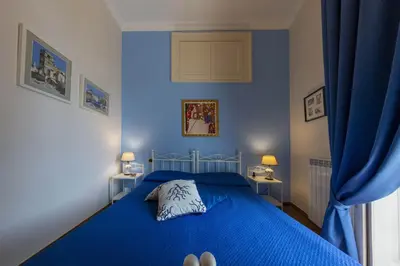 Letto o letti in una camera di B&B Residenza Via Dei Mille