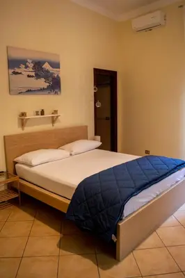 Letto o letti in una camera di B&B Il Gobbetto