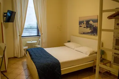 Letto o letti in una camera di B&B Il Gobbetto