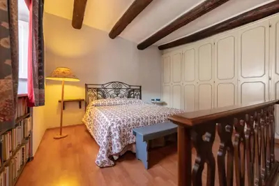 Letto o letti in una camera di Un Posto Al Centro