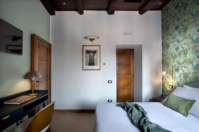 Letto o letti in una camera di La Nova Bed and Museum