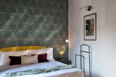 Letto o letti in una camera di La Nova Bed and Museum