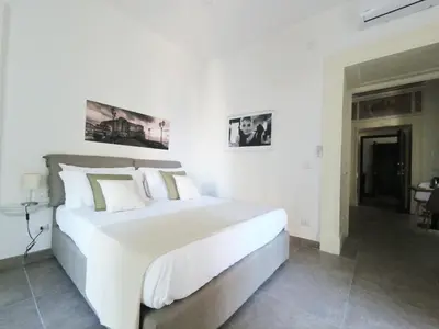 Letto o letti in una camera di questo rinascimento CASA AUDREY