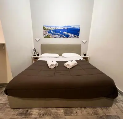 Letto o letti in una camera di CASA MARTINO FORMALE