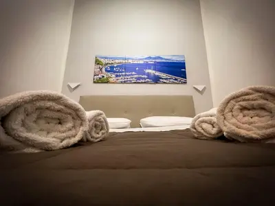 Letto o letti in una camera di CASA MARTINO FORMALE