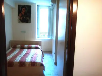 Letto o letti in una camera di IL Cinquecento
