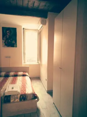 Letto o letti in una camera di IL Cinquecento