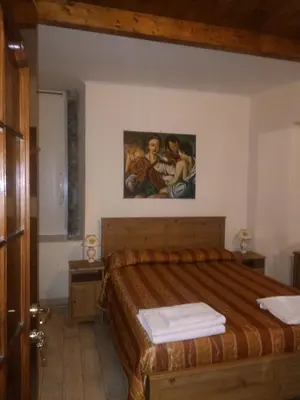 Letto o letti in una camera di IL Cinquecento
