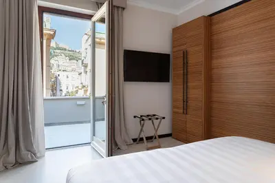 Letto o letti in una camera di Hotel Poerio 25 Boutique Stay