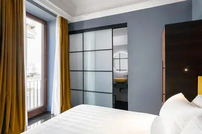 Letto o letti in una camera di Hotel Poerio 25 Boutique Stay