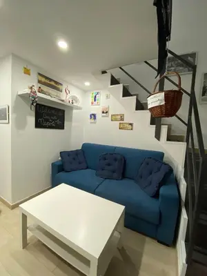 Area soggiorno di Una Notte a Napoli