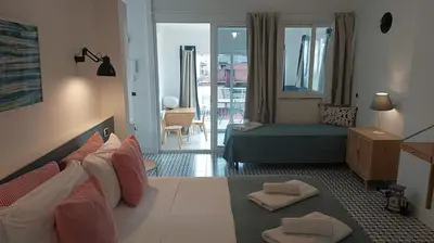 Letto o letti in una camera di Tribunali Penthouse with panoramic terrace
