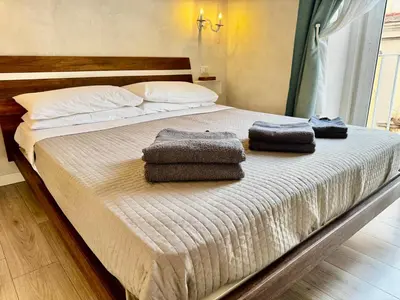 Letto o letti in una camera di Venustas Napoli Toledo