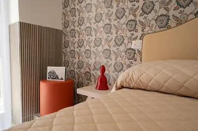 Letto o letti in una camera di HR Boutique Porto, Napoli Centro, by ClaPa Group