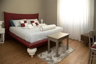 Letto o letti in una camera di Belvedere 75