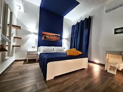 Letto o letti in una camera di City Focus Apartments Napoli