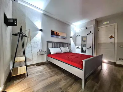 Letto o letti in una camera di City Focus Apartments Napoli