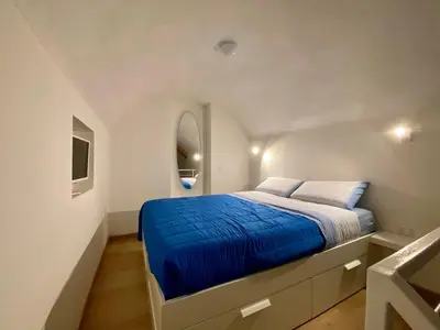Letto o letti in una camera di Dimora Spaccanapoli