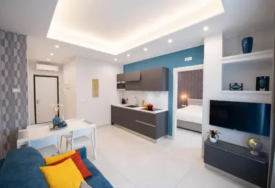 TV o dispositivi per l'intrattenimento presso Napoli City Center - Appartamenti e Camere